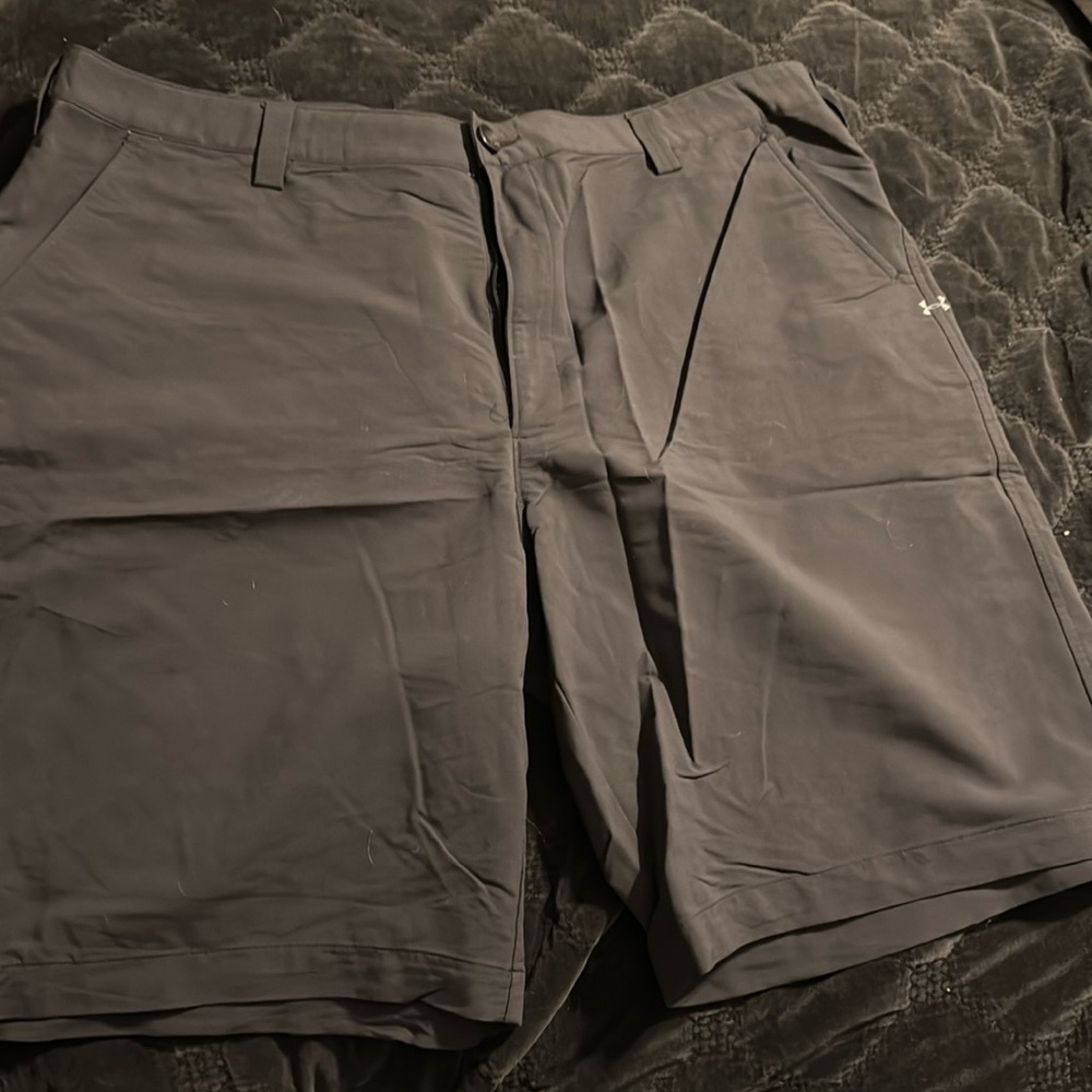 Under Armour black shorts size 42.